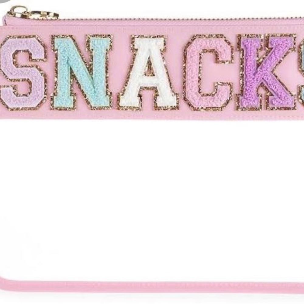 Pink varsity lettering XL clear nylon bag with wrist strap.